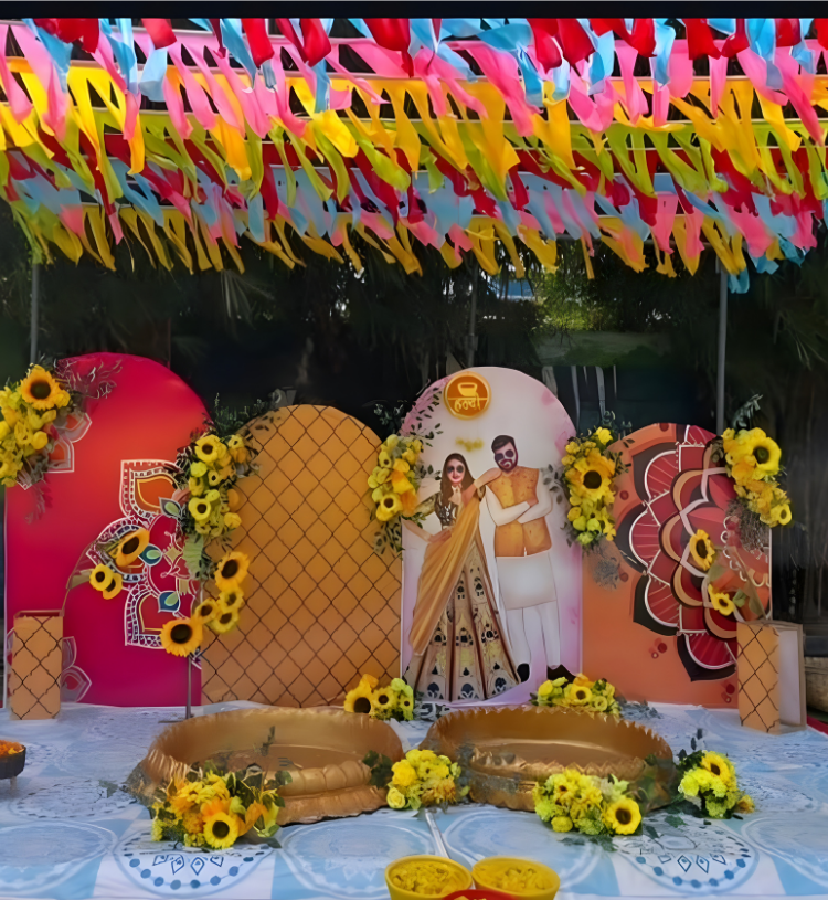 Outdoor Haldi Ceremony Decoration with Colorful Backdrop, Sunflower Floral Styling and Ribbon Canopy
