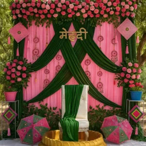 Luxury Mehndi Ceremony Stage Decoration with Green Drapes, Pink Flowers and Traditional Props