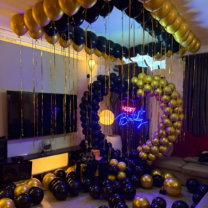 Luxury Black and Gold Birthday Room Decoration with Balloon Arch, Ceiling Balloons and Neon Light